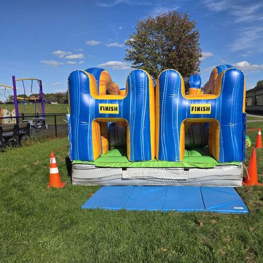 Inflatable obstacle finish set up on a lawn