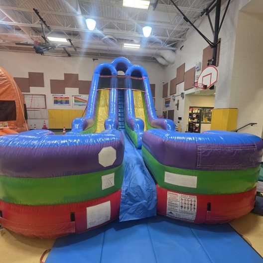 Dual-lane inflatable slide set up for a party