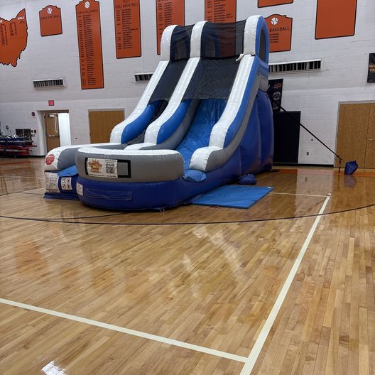 Inflatable slide set up for a summer party
