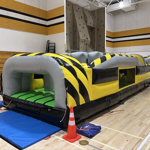 Inflatable obstacle course set up for a school event